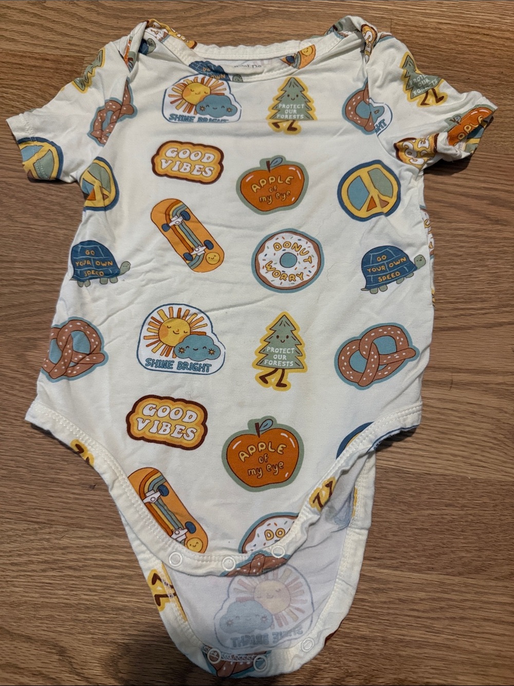 Angel Dear White Bodysuit with Orange and Blue Good Vibes Graphics